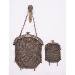 A Chinese silver mesh purse, bears finesse mark: together with a smaller mesh purse, 87gms, 2.