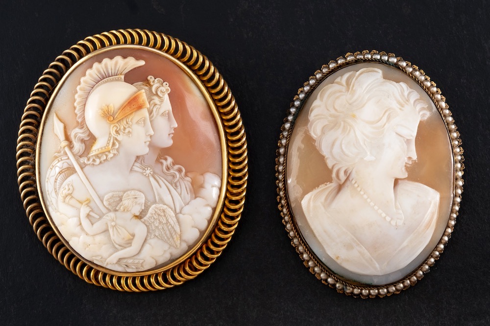 Two carved shell cameo brooches:, one depicting Mars,