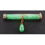 An early twentieth century 18ct gold jade mounted bar brooch with jade pendant drop,