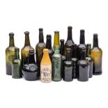 A collection of English and Continental primarily cylinder wine bottles: including sealed examples