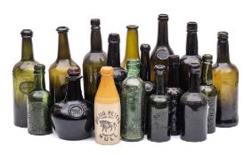 A collection of English and Continental primarily cylinder wine bottles: including sealed examples