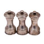 A pair of Elizabeth II silver pepper mills, maker C J Vander Ltd, Birmingham,