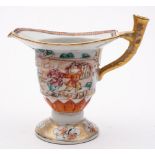 A Chinese export famille rose jug: of helmet shape with gilt stalk handle,