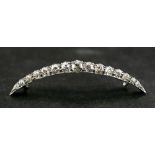 An old and single-cut diamond, crescent brooch,: total estimated diamond weight ca. 1.