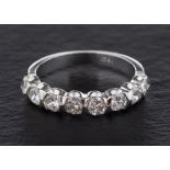 A round, brilliant-cut diamond half-eternity ring,: total estimated diamond weight ca. 0.