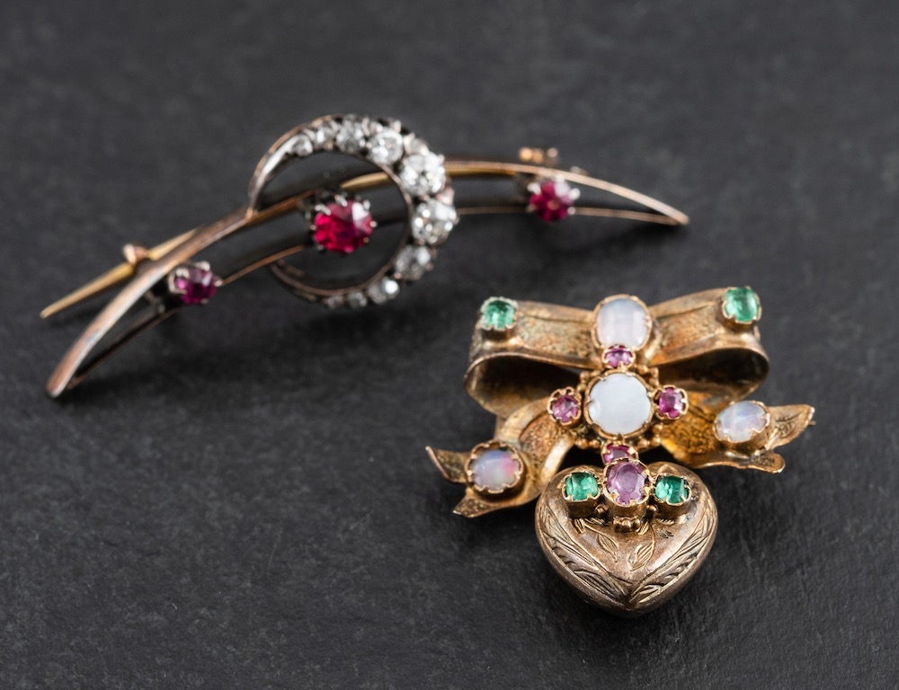 Two gold brooches,: one old-cut diamond and synthetic ruby crescent brooch,