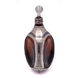 An Egyptian brown glass, silver and niello decorated decanter: of dimple shape,