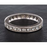 A round, brilliant-cut diamond full-eternity ring,: total estimated diamond weight ca. 0.