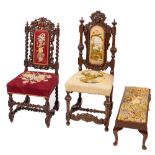 Two Victorian carved oak and tapestry work upholstered side chairs in Jacobean style,