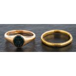 Two gold rings,: a 15ct gold, bloodstone, signet ring engraved with monogram,