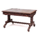 A George IV or William IV carved oak library table, in the manner of designs by Anthony Salvin,