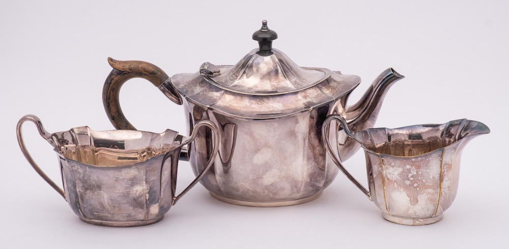 An electro-plated three-piece teaset: a clear glass and plate mounted claret jug, - Image 2 of 2