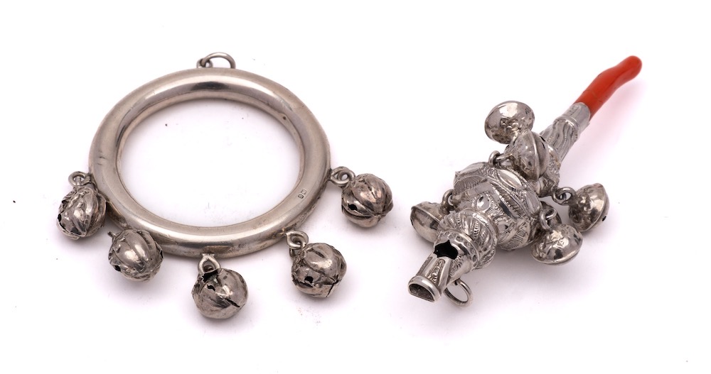 A Victorian child's silver rattle, maker Hilliard & Thomason, Birmingham, 1897: with whistle,