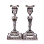 A pair of late Victorian silver candlesticks, maker Thomas Bradbury & Sons, London,