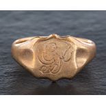 A 9ct gold signet ring,: with indistinct monogram engraving and hallmarks for London, 1930,