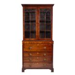 WITHDRAWN A Regency Scottish mahogany and inlaid secretaire chest with associated bookcase,