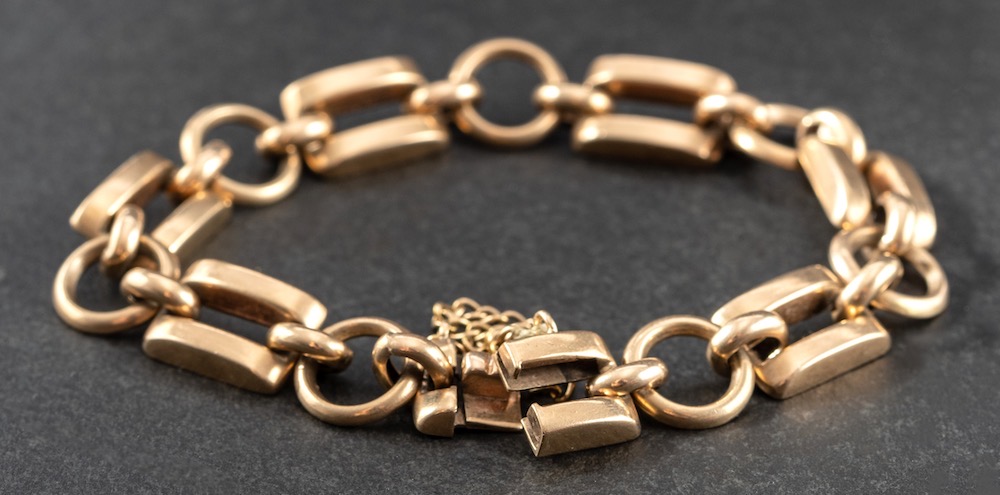 A 9ct gold, fancy-link bracelet,: with hallmarks for Birmingham, 1963, length ca.