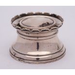 A George V silver inkwell, unknown maker, Birmingham, 1928: of circular outline,