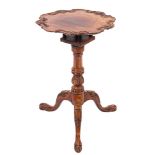 A carved and stained hardwood occasional table in George III style, possibly Chinese,