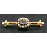 An amethyst and seed pearl bar brooch,: length of brooch ca. 4.6cm, total weight ca. 5.6gms.
