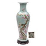 A large Chinese famille rose baluster vase: finely enamelled with four birds perched on a gnarled