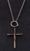 A silver crucifix on chain: the crucifix hallmarked for silver,
