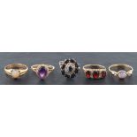 Five rings,: including a 18ct gold opal ring with hallmarks for London, 1916, ring size Q,