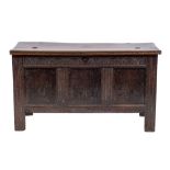 A Jacobean oak coffer, late 17th century and later adapted,