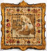 A 19th century gilt framed woolwork tapestry: depicting a women and a young boy in a rowing boat,