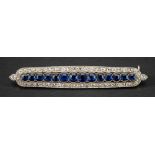 An early twentieth century, 18ct gold and silver sapphire and diamond brooch,