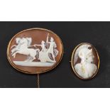 Two carved shell cameo brooches,: one depicting Mars in profile,