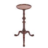 A George III mahogany 'kettle stand' or vase table, circa 1770 and later,