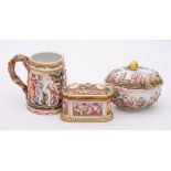 Three pieces of Naples porcelain: each with raised classical decoration of bacchanalian and merry