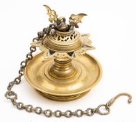 A Sumatran brass hanging temple oil lamp: of stella design, with domed and pierced cover,