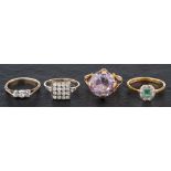 Four gemset rings,: including an emerald and diamond ring, estimated total diamond weight ca. 0.