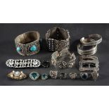 A collection of silver jewellery,: including three bracelets, two bangles, two pairs of buckles,