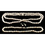 A cultured pearl necklace,: the single strand necklace composed of uniform 7mm cultured pearls,