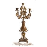 A Victorian gilt metal four branch candelabrum:,