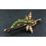 WITHDRAWN A peridot, ruby and seed pearl dragonfly brooch,: length ca. 5cm, total weight ca. 6gms.