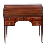 A late George III mahogany and crossbanded roll top desk, early 19th century,