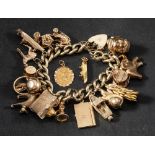 A 9ct gold curb-link, charm bracelet with charms,: the heart-shaped clasp with hallmarks for London,