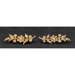 A pair of Victorian, gold, cushion-cut diamond and seed pearl flower brooches,
