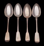Four assorted silver Fiddle pattern tablespoons, various makers and dates: two initialled,