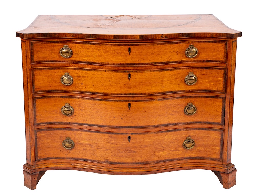 A fine George III satinwood and rosewood crossbanded serpentine commode,