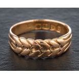 An 18ct gold ring designed as a head of corn,: hallmarks for Chester, 1899, ring size M,