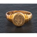 An 18ct gold signet ring,: engraved with monogram, with hallmarks for Birmingham, 1894,