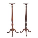 A pair of mahogany torchere or vase stands in George III style, 19th century,