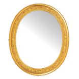 A Victorian giltwood and composition framed oval wall mirror, late 19th century,