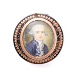 A late 18th century tortoiseshell and gold piquet work snuff box: of circular outline,