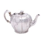 A George V silver teapot, maker Elkington & Co, Birmingham, 1919: of lobed melon-shaped outline,